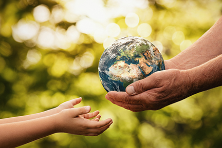 Grandparent passing earth to child