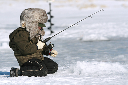 Boy ice fishing