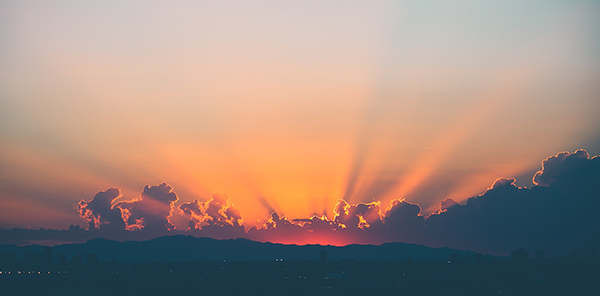 Sun rays behind clouds