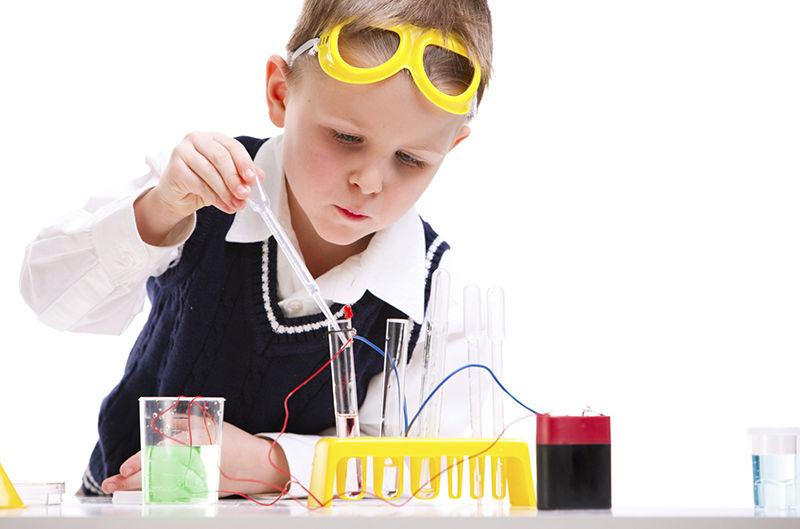 Child doing science experiment