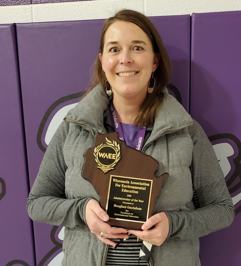  Photo of Meaghan Gustafson with award