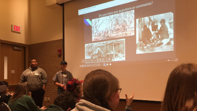 Photo of students giving a presentation